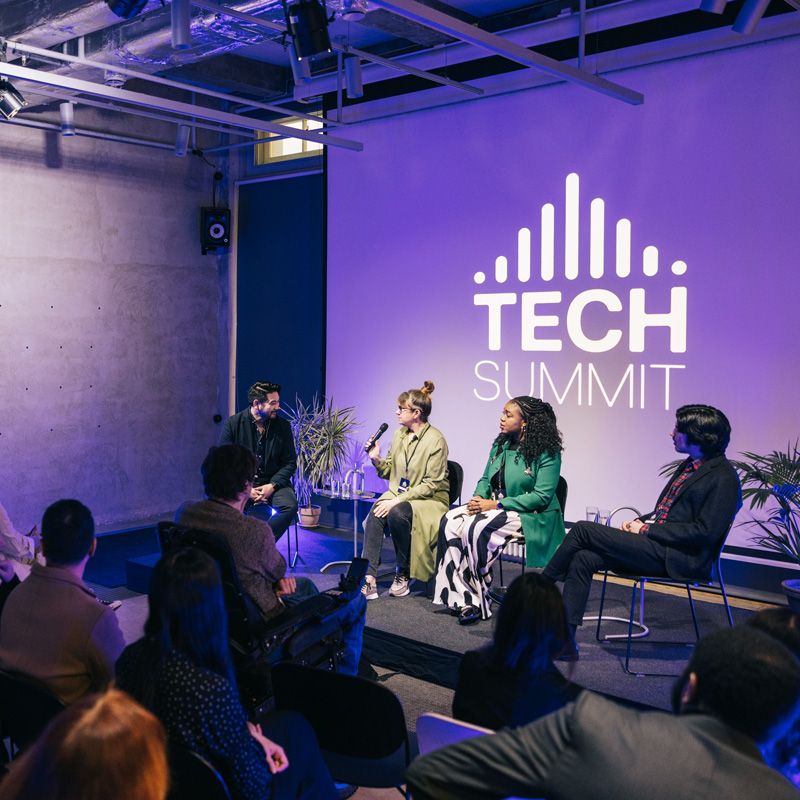 Live event of people talking in Denver, CO