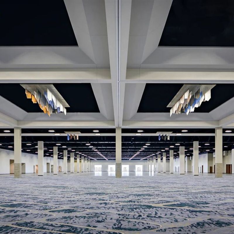 Spacious room with blue carpet and white ceiling, ideal for events and AV setups in Denver, CO